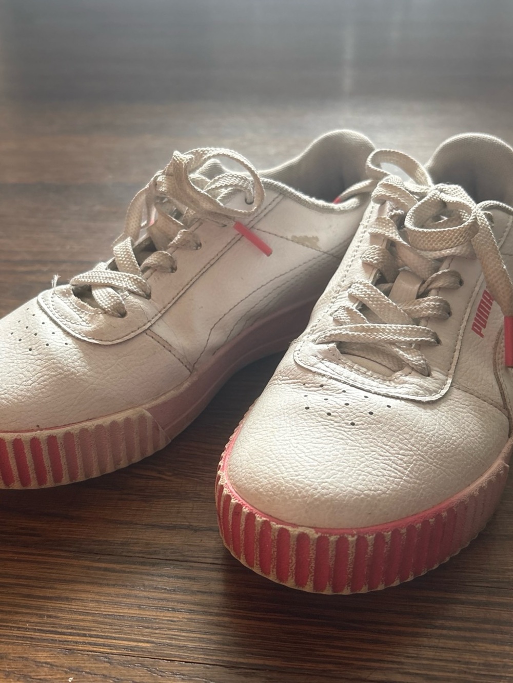 Puma White Sneakers with Pink Sole Accents